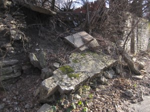 Collapsed section of East Alley's retaining wall